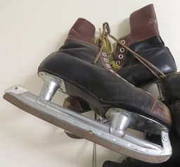 Black and brown ice skates